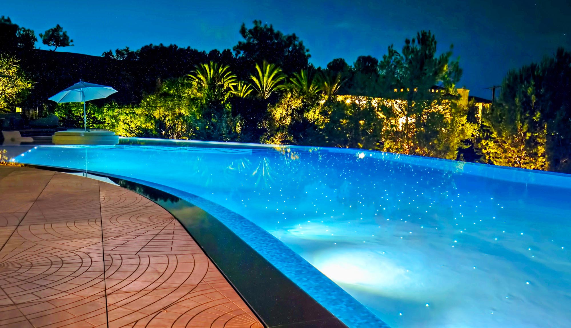 Pool at night with interiors lights