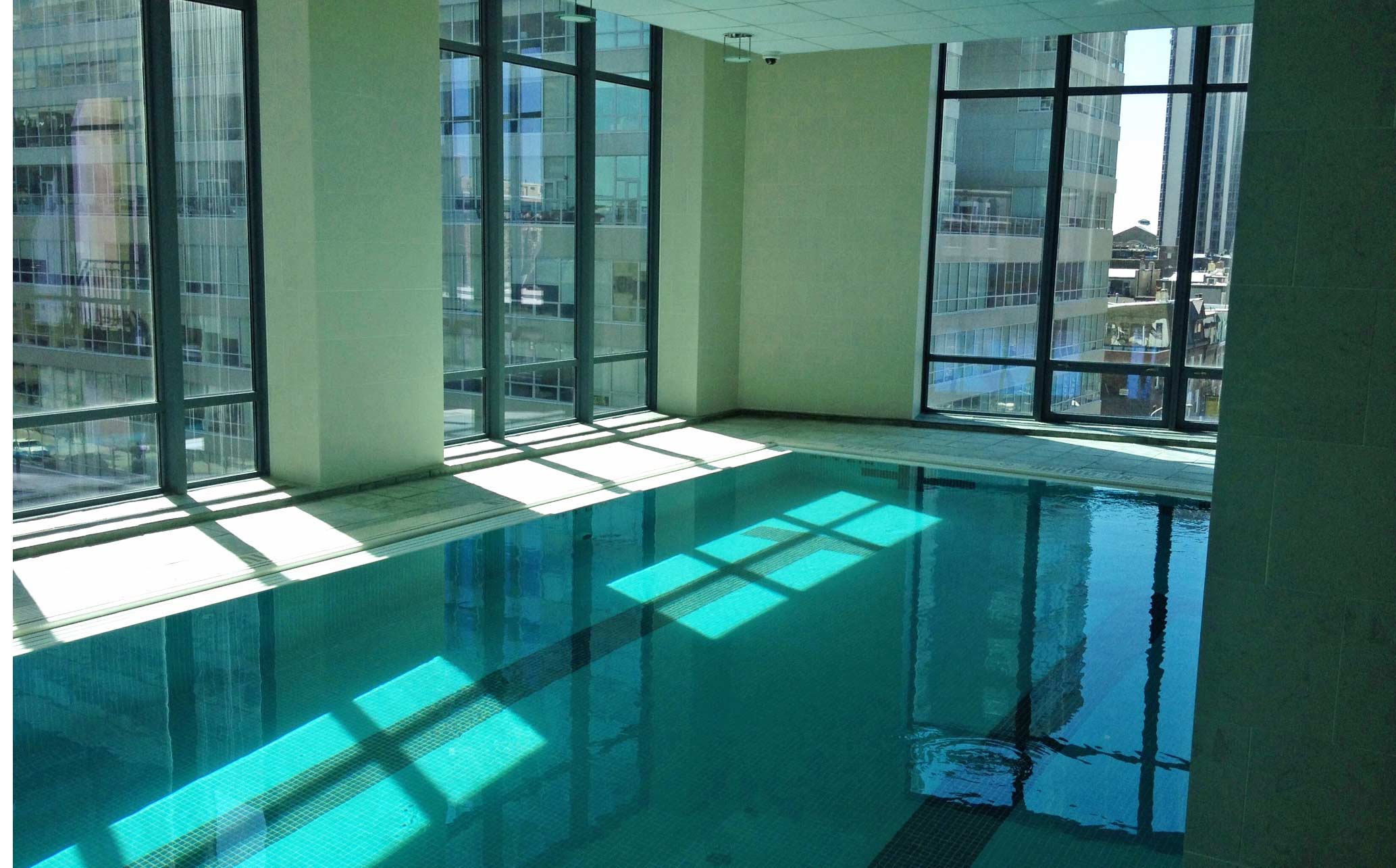 Hospitaltiy and Resort indoor pool with large windows